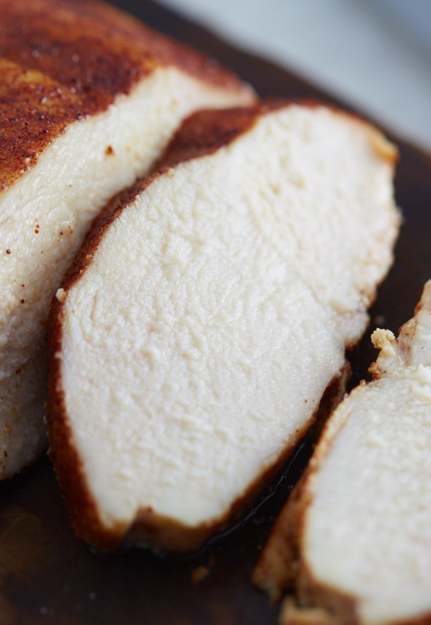 Slices of slow roasted chicken breast, moist and juicy.