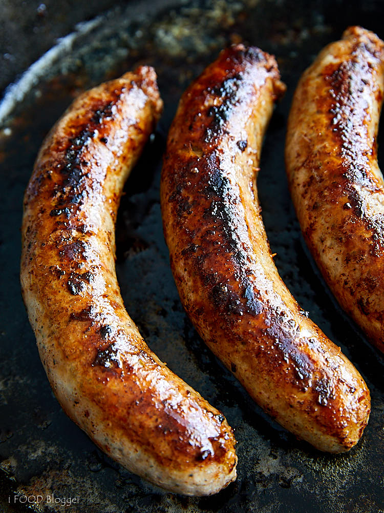 Close up view of browned and juicy bratwurst sausages.