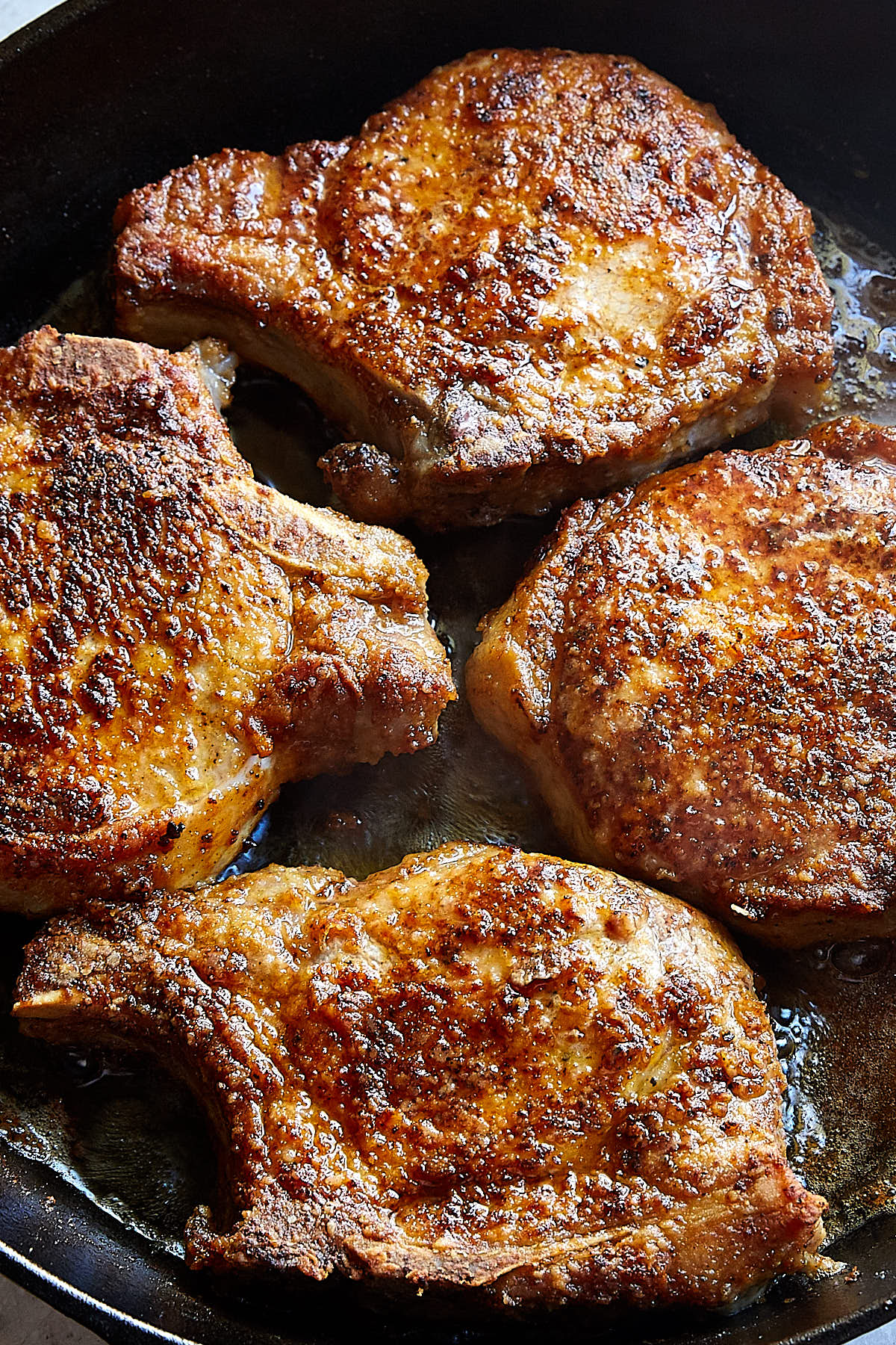 Close up of well-browned Southern fried pork chops.