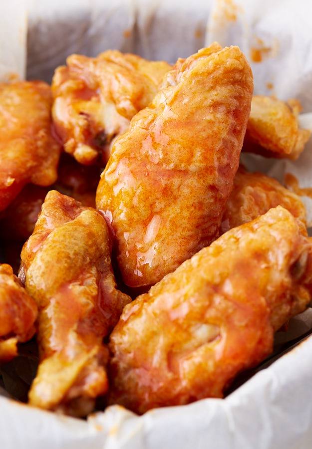 Crispy baked chicken wings tossed with buffalo sauce.