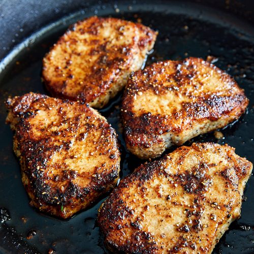Delicious, tender and juicy pan-fried boneless pork chops made in under 10 minutes. A perfect recipe for a busy workday dinner. | ifoodblogger.com