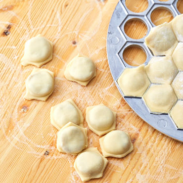 Pelmeni, or meat dumplings, is a traditional Russian dish that is know all over the world. Here is how you can make the best traditional pelmeni at home.
