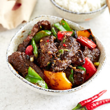 Hunan beef with peppers and asparagus. The classic spicy hunan beef dish made a little healthier with the addition of colorful bell peppers and asparagus. Serve with steamed rice and enjoy one those dishes that will make you forget about Chinese take-out forever.