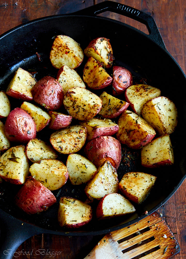 Roasted potatoes in cast iron pan.