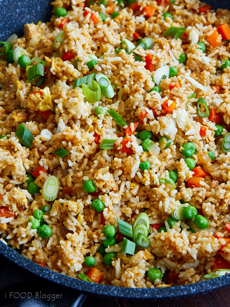 A close up view of Japanese fried rice (hibachi style) in a wok.