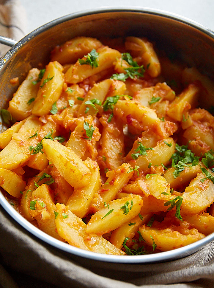 Sauteed Hungarian potatoes in a pan.