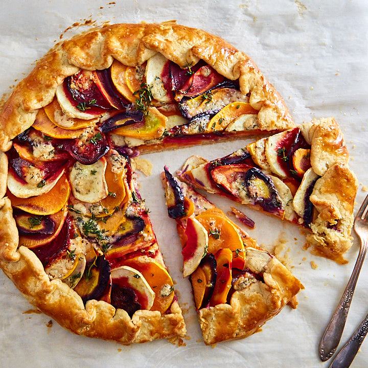 Vegetable galette cut into slices.