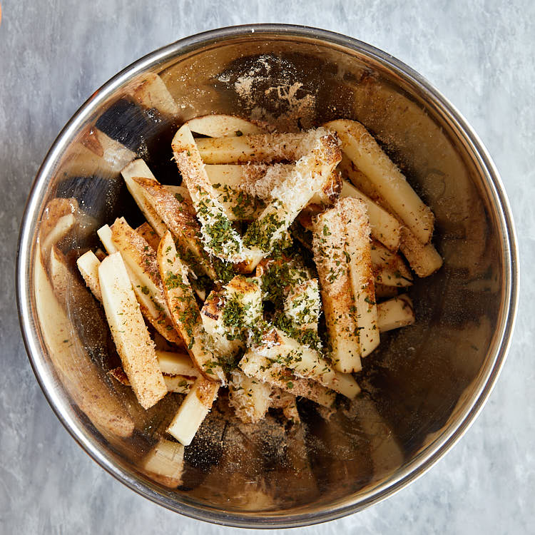 Truffle fries recipe instructions – put ingredients in a large bowl