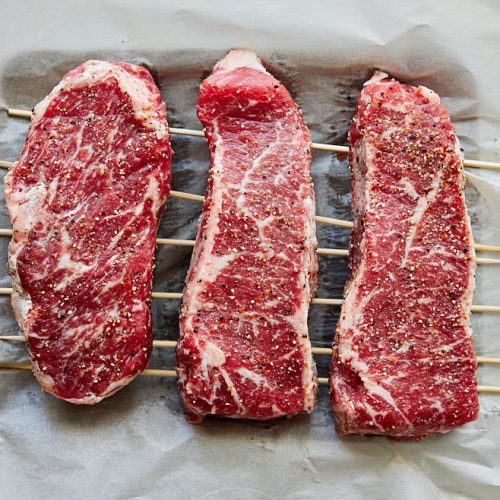 Salting steak in a fridge for a few hours before broiling makes them tender and more flavorful.