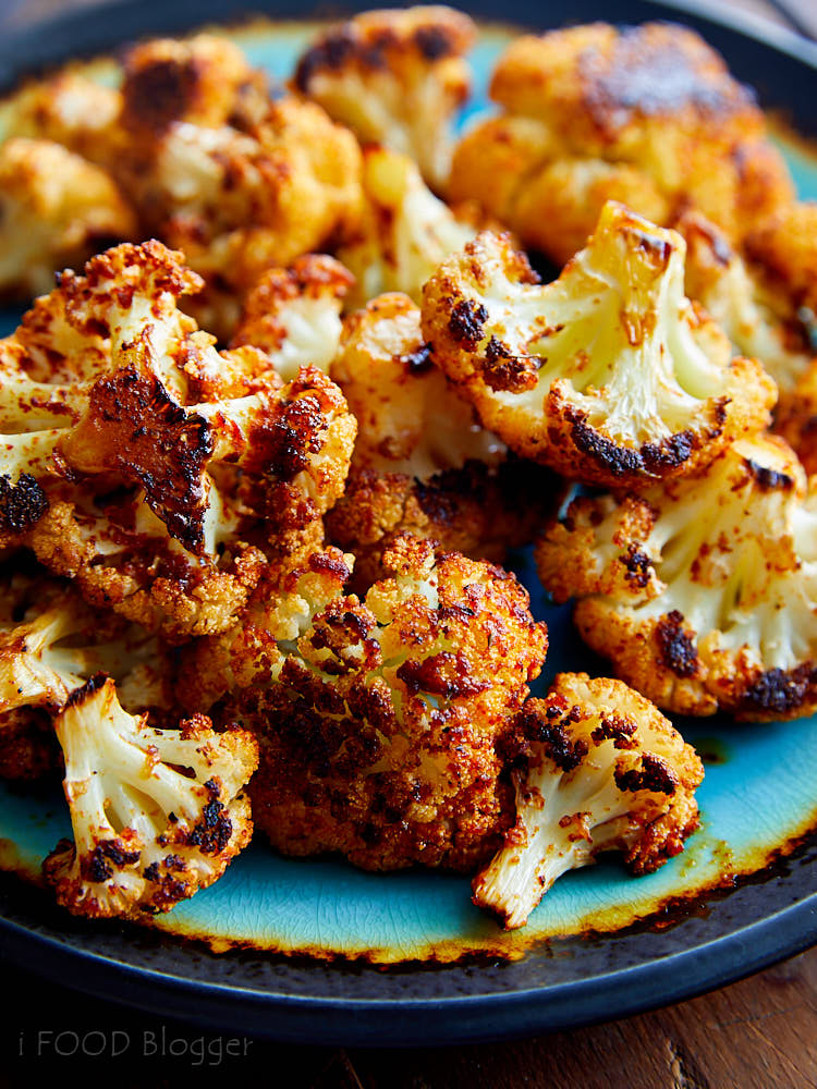 Close up of golden brown roasted cauliflower florets.