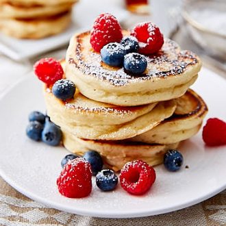 Five ingredient, super easy Homemade Pancakes Without Eggs. Fluffy and airy texture. No eggs required in this pancake batter recipe. These are the best buttermilk pancakes, hands down. | ifoodblogger.com