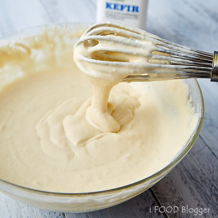 Eggless pancake batter in a bowl with a whisk.