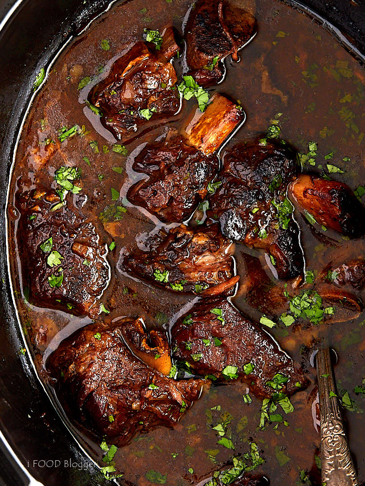 Top down view of slow cooker beef short ribs inside Crock Pot.