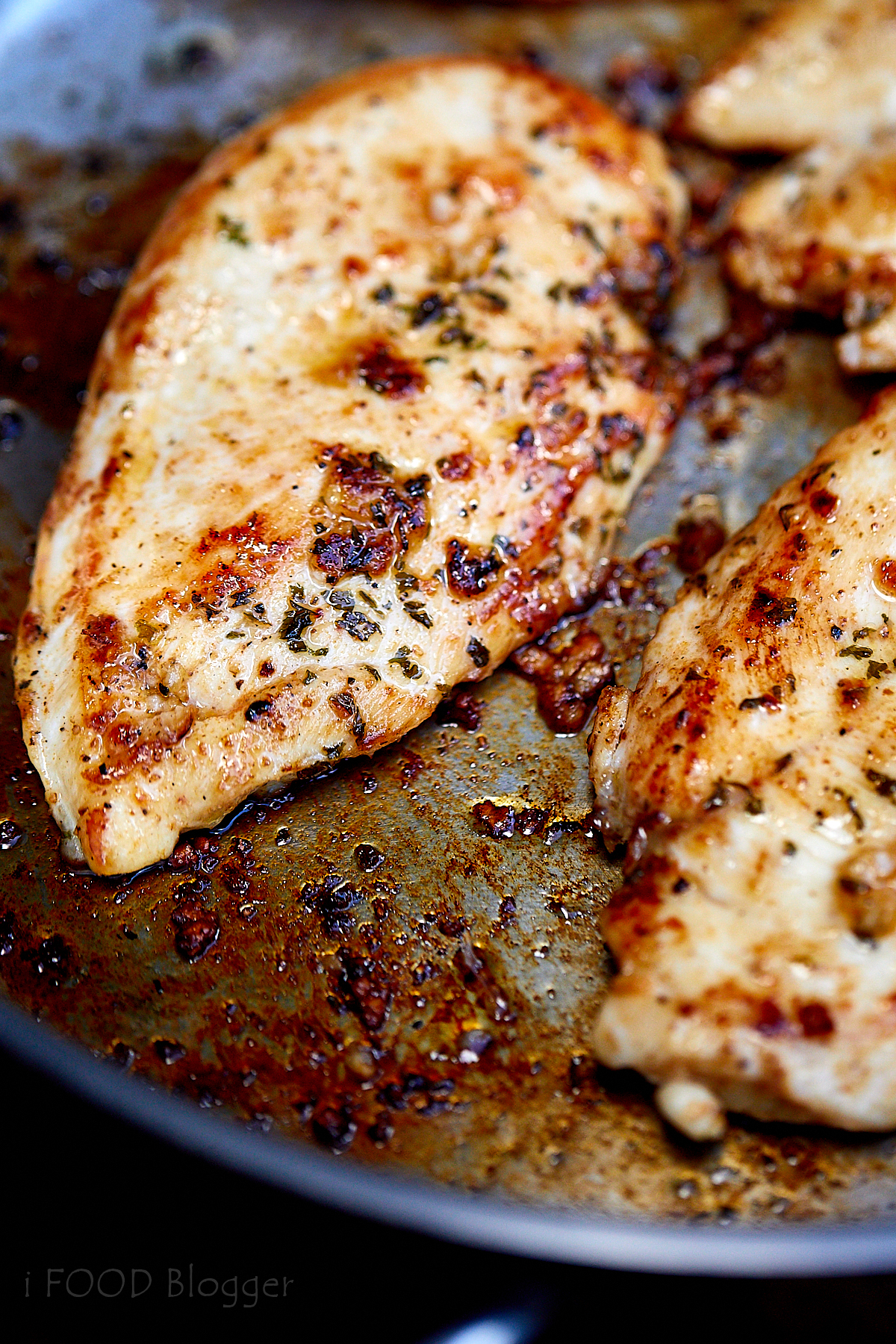 Close up of a large fried chicken breast.