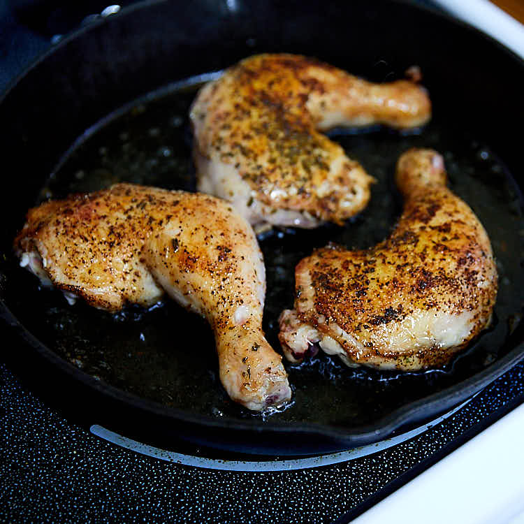 Crispy-skinned and fall-off-the-bone tender oven roasted chicken leg quarters. Very easy to make and perfect every time. | ifoodblogger.com