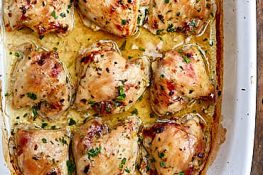 Bake chicken thighs, boneless and skinless, seasoned with maple syrup, apple cider vinegar, garlic, fresh parsley and sesame oil. Tender, slightly sweet and tart, and absolutely delicious. | ifoodblogger.com
