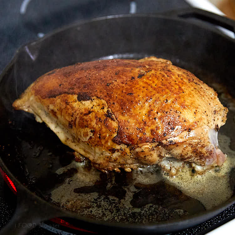 Pan searing turkey breast for better skin crispiness before roasting. | ifoodblogger.com