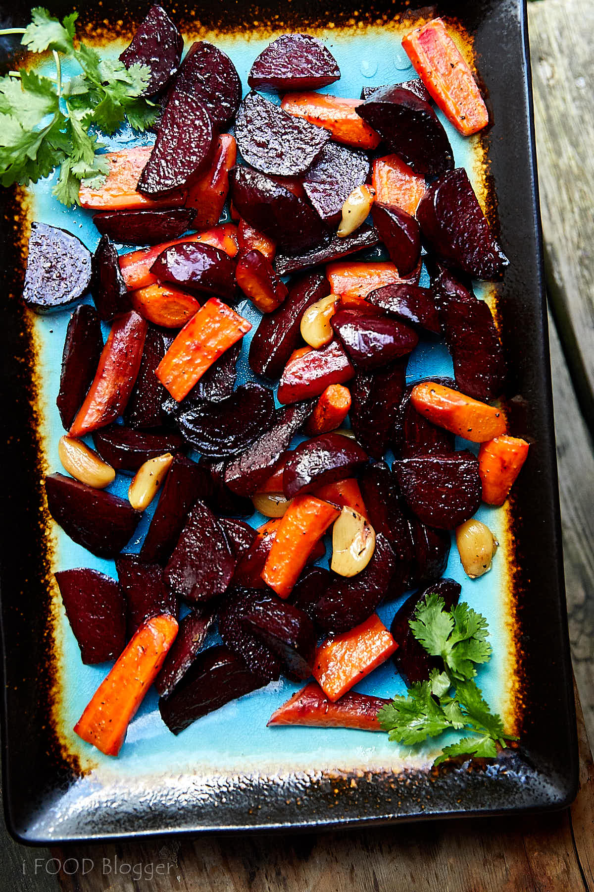 Roasted Beets and Carrots with Feta on a serving platter.