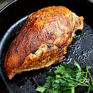 Oven roasted turkey breast - brined for two hours for best flavor, crispy skin on the outside and tender, moist meat on the inside.| ifoodblogger.com