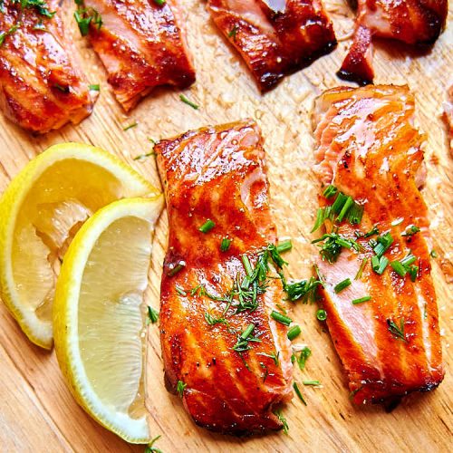 Salmon bellies glazed with delicious Asian inspired sauce and air fried to crispy perfection. This is one of the best salmon belly recipes and is a must try. | ifoodblogger.com