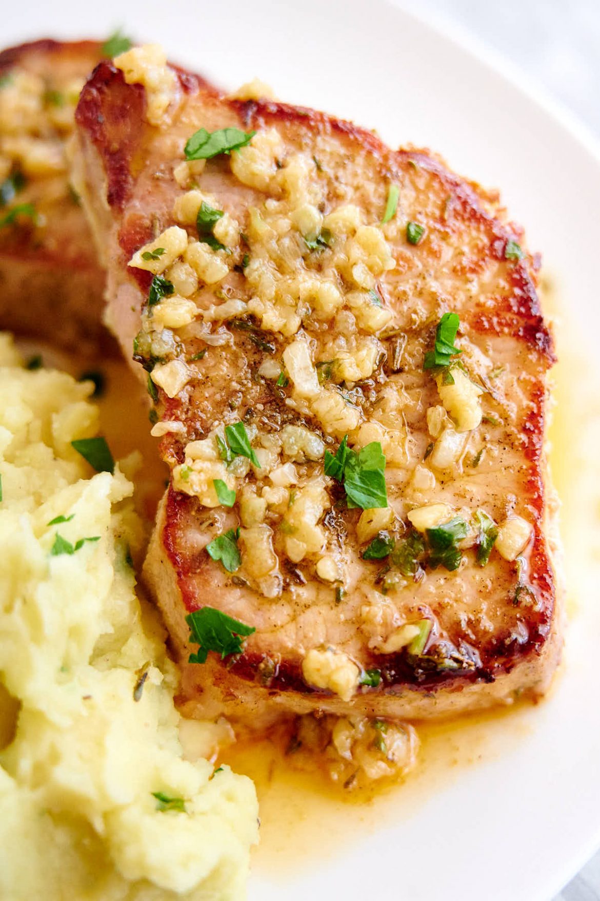 Baked Pork Chops with Browned Garlic Butter - Craving Tasty