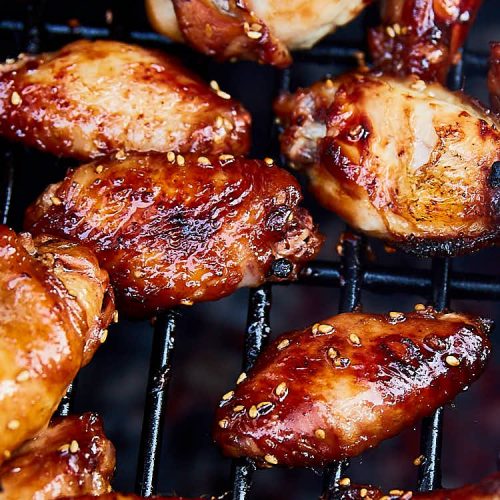 Grilled chicken wings, first marinated in Korean bulgogi marinade then grilled to perfection. This grilled chicken wing recipe will sure become your favorite. One of the best Korean inspired chicken wing recipes. | ifoodblogger.com