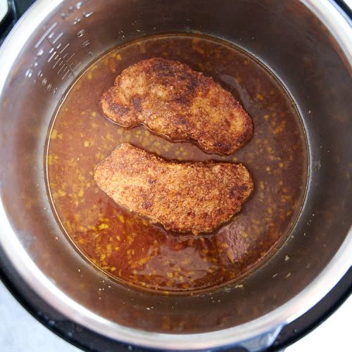Fully cooked pork chops in the Instant Pot.
