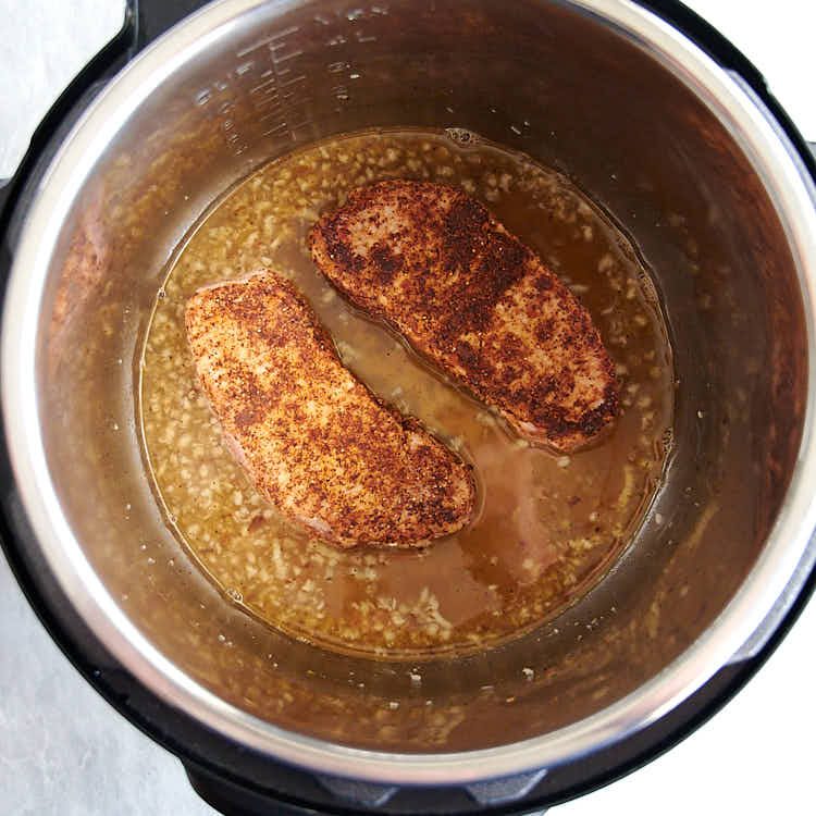 Pork chops in the Instant Pot with honey garlic sauce.