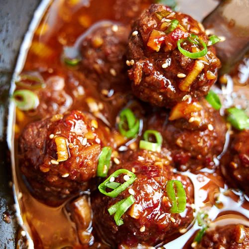 Asian meatballs inside slow cooker.