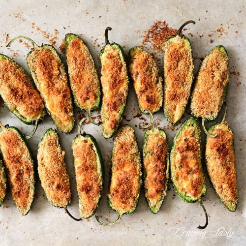 Well-browned under a broiled baked jalapeno poppers on a baking sheet.