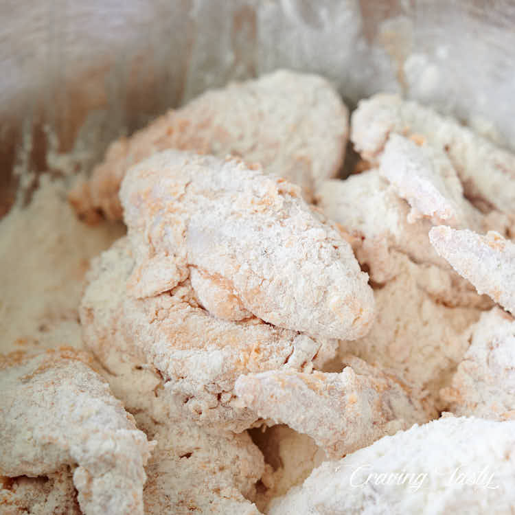 Chicken wings rolled in flour.