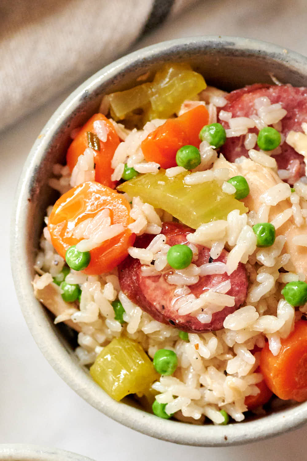 Chicken bog in a bowl with celery and carrots mixed in