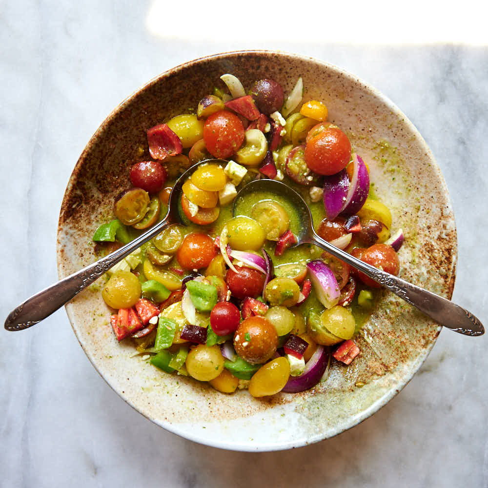 Cherry tomato salad with spoons