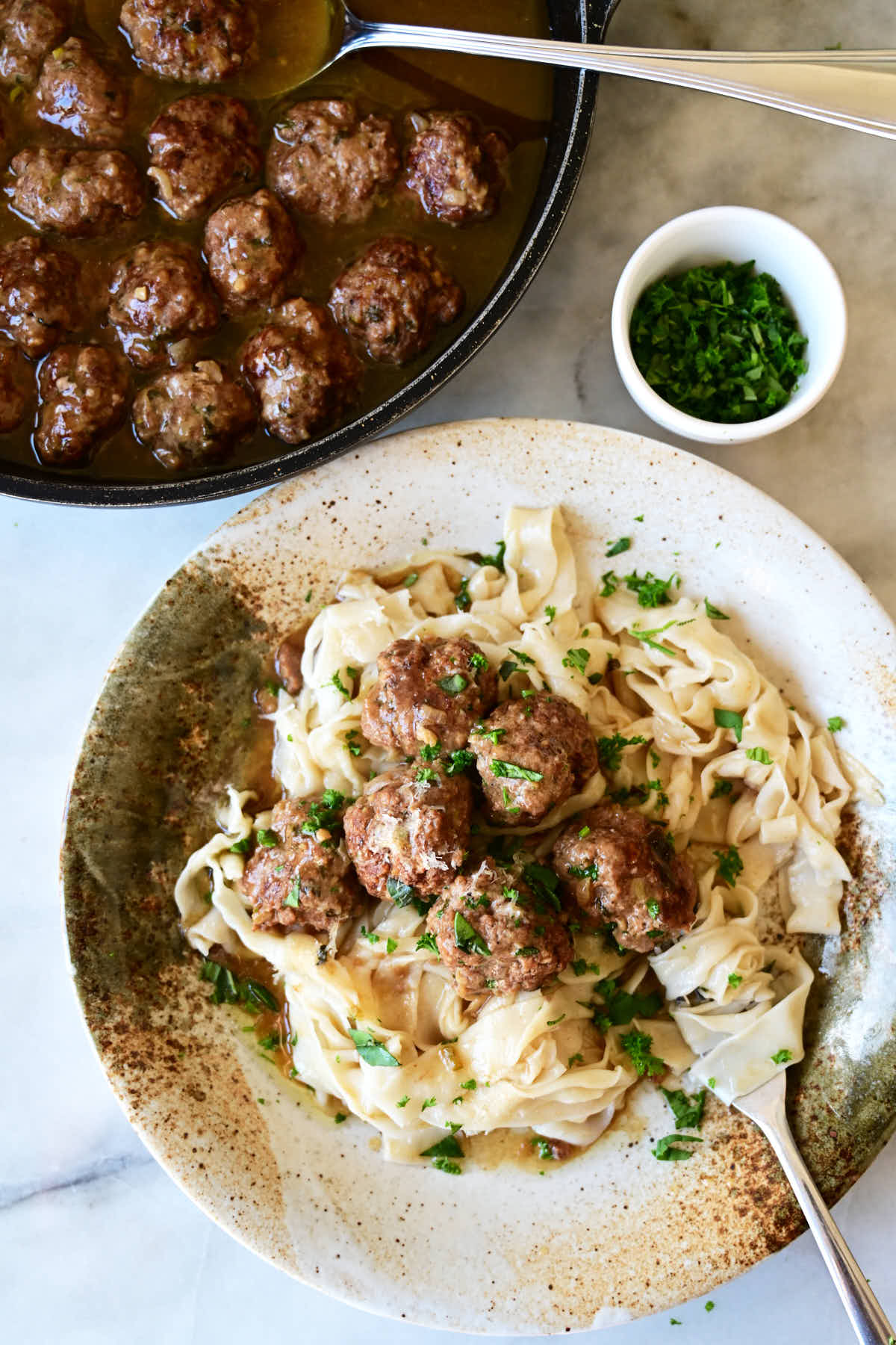 Beef meatballs made with fresh herbs and caramelized onions.